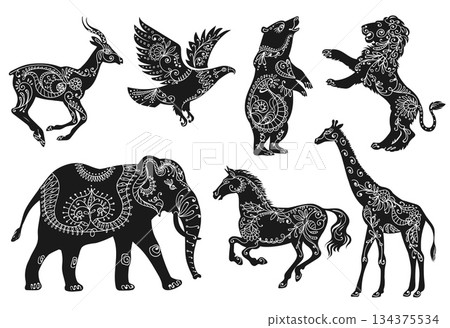 Animalistic floral silhouettes. Black fauna shapes with flowers patterns, boho style animals, ethnic oriental ornaments, wildlife elephant, horse and giraffe. Splendid vector cartoon flat set Animalistic floral silhouettes. Black fauna shapes with flowers patterns, boho style animals, ethnic oriental ornaments, wildlife elephant, horse and giraffe. Splendid vector cartoon flat set 134375534