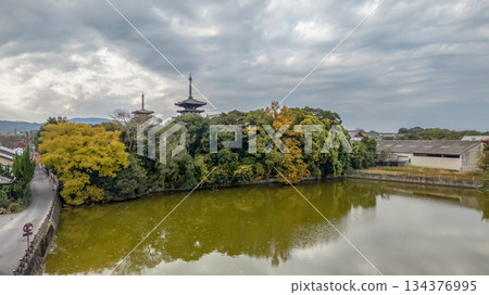 Nov 27 2025 Autumn View Of Japanese Temple Pagodas Surrounded By Trees 134376995