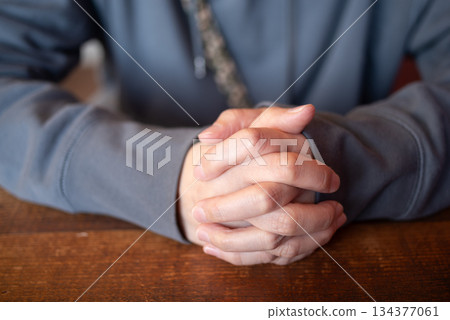 Hands of a woman who joins hands Hands of a woman who joins hands 134377061
