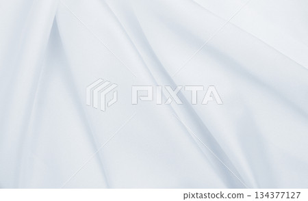 Smooth elegant grey silk or satin luxury cloth as wedding background. Luxurious Christmas background or New Year background design 134377127