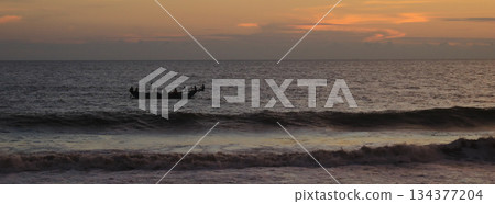 Outlines of a wooden fishing boat near Galle, Sri Lanka. 134377204