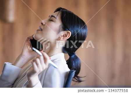 Businesswoman troubled by work troubles Businesswoman troubled by work troubles 134377558