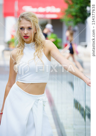 Woman wearing crop top and culottes 134377638