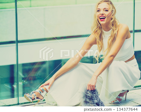 Woman wearing crop top and culottes 134377644