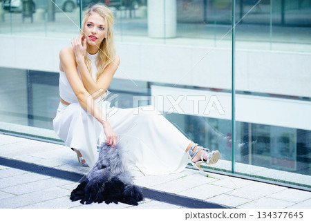 Woman wearing crop top and culottes Woman wearing crop top and culottes 134377645