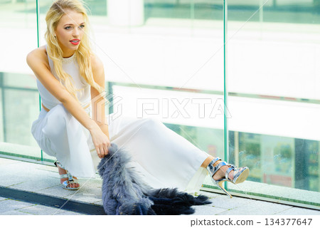 Woman wearing crop top and culottes Woman wearing crop top and culottes 134377647