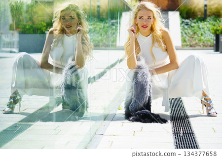 Woman wearing crop top and culottes Woman wearing crop top and culottes 134377658