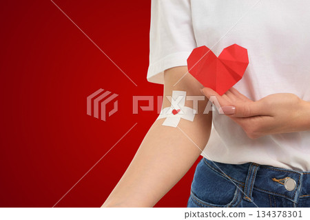 Blood donation drive shows a donor with a heart symbol Blood donation drive shows a donor with a heart symbol 134378301