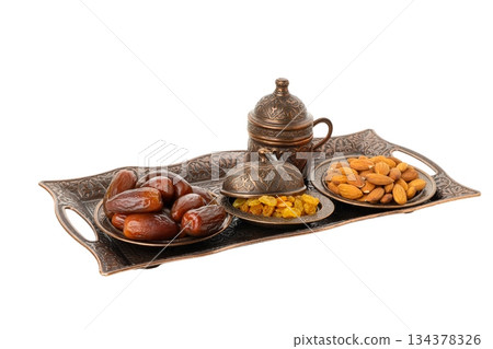 Arabic tray of dates, nuts, and dried fruits, isolated, PNG Arabic tray of dates, nuts, and dried fruits, isolated, PNG 134378326