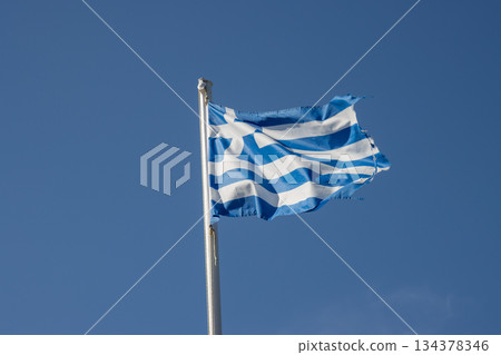 Greek flag and a blue sky, Paxos, Greece 134378346