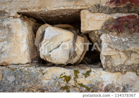 Detail of a wall with a roped stone, Greece 134378367