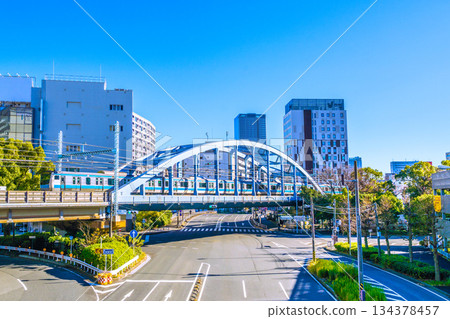Yokohama cityscape in Japan, with views of Sakuragicho 1-chome, the base gate in front of Kannai Station, Yokohama Kannai Tower, trains, etc. 134378457