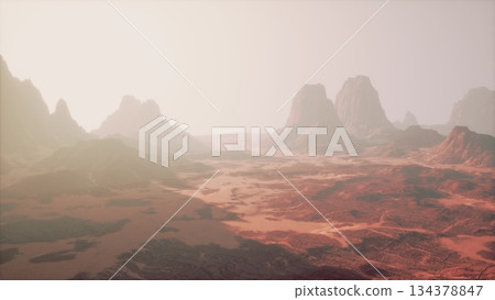 Breathtaking desert scene showcasing rugged mountains and arid terrain. The soft light casts a warm glow, creating an ethereal atmosphere as day transitions to night. Breathtaking desert scene showcasing rugged mountains and arid terrain. The soft light casts a warm glow, creating an ethereal atmosphere as day transitions to night. 134378847
