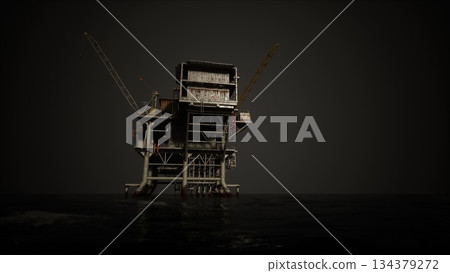 An offshore oil drilling rig stands tall against a darkening sky. The structure is surrounded by calm waters, highlighting its industrial design and significance in energy production. An offshore oil drilling rig stands tall against a darkening sky. The structure is surrounded by calm waters, highlighting its industrial design and significance in energy production. 134379272