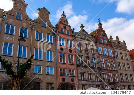 Historic buildings in Gdansk under blue sky with clouds Historic buildings in Gdansk under blue sky with clouds 134379447