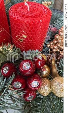 red candles in the form of a garland 134379534