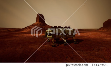 On the red planet, a high tech rover stands on the rocky landscape, surrounded by towering cliffs and a hazy atmosphere. The scene captures the essence of space exploration and adventure. 134379880