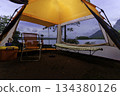 Camping tent, view from inside the tent to see the view outside the mountain, forest, lake, camping tent on a high mountain 134380126