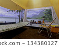 Camping tent, view from inside the tent to see the view outside the mountain, forest, lake, camping tent on a high mountain 134380127