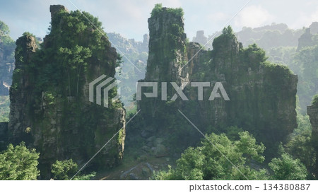 Towering rock formations rise majestically from the earth, covered in rich greenery. The sun casts a gentle light over the landscape, enhancing the tranquil atmosphere of this natural wonder. 134380887