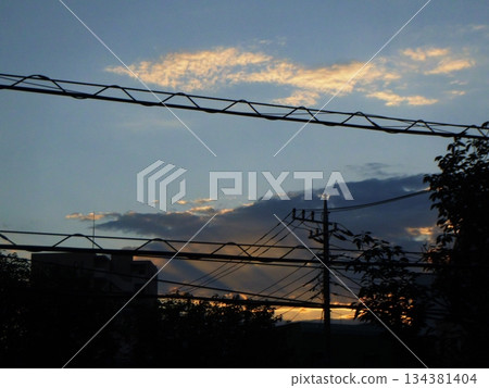 Dusk sky and power lines Dusk sky and power lines 134381404