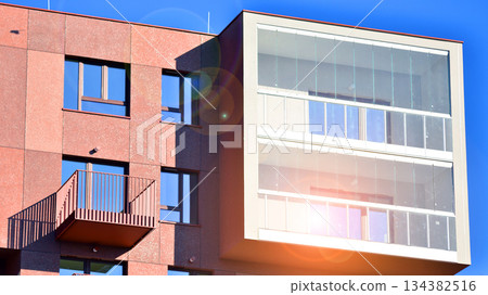 Modern European residential apartment buildings quarter. Abstract architecture, fragment of modern urban geometry. Modern European residential apartment buildings quarter. Abstract architecture, fragment of modern urban geometry. 134382516