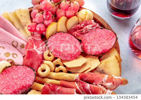 Italian Antipasti close-up. Charcuterie platter with prosciutto, salami 134383454
