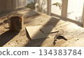 Cozy Morning Light: Coffee, Keys, and Notes on Wooden Table 134383784