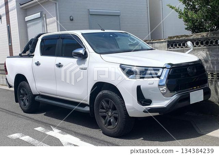 Pickup truck parked in a parking lot Pickup truck parked in a parking lot 134384239
