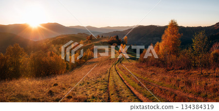 Dawn time. Wide panorama, majestic view of autumn Carpathians Dawn time. Wide panorama, majestic view of autumn Carpathians 134384319