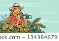 Woman explorer with binoculars in tropical nature 134384679