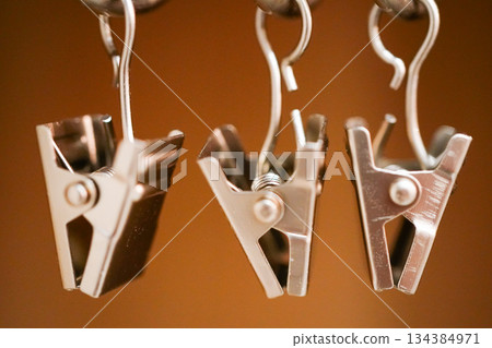 Clothespins, everyday tools, minimalist composition, metallic texture, still life photography Clothespins, everyday tools, minimalist composition, metallic texture, still life photography 134384971