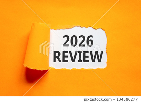 2026 Review symbol. Concept words 2026 Review on beautiful white paper. Beautiful orange paper background. Business and 2026 review concept. Copy space. 134386277