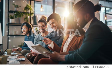Group of friends discussing ideas in a bright space with natural light during a work session 134386390