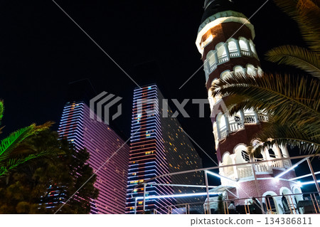 Glowing tall building at night in Batumi, Georgia Glowing tall building at night in Batumi, Georgia 134386811