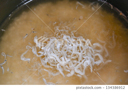 Whitebait rice cooked in a rice cooker Whitebait rice cooked in a rice cooker 134386912