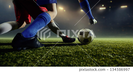 Fast football sprint of two players chase for ball Fast football sprint of two players chase for ball 134386997
