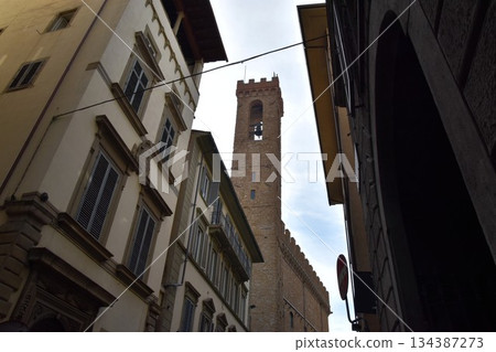 Looking up at the medieval stone architecture of the Bargello Museum in Florence 134387273