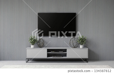 Elegant Grey Wall - A ribbed grey wall holding a mounted screen above a minimalist TV stand with plants, metal 134387812