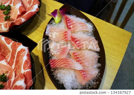 Close-up of sashimi on ice 134387927