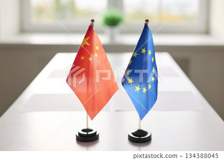 China and European Union flags on meeting table, symbol of diplomacy and talks 134388045