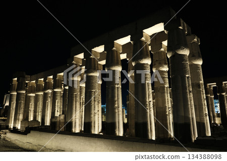 Illuminated Ancient Temple Columns at Night Illuminated Ancient Temple Columns at Night 134388098