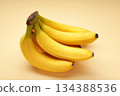 Bunch of bananas on beige background. Top view 134388536