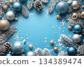 Blue background with snowflakes and Christmas decorations. Happy 2025 New Year 134389474