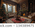 Large room with fireplace and Christmas tree, decorated with red and gold accents, giving it warm and cozy atmosphere 134389475