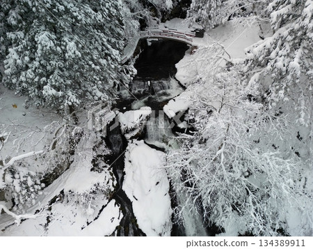 Snow scene at Shirogane Falls 134389911
