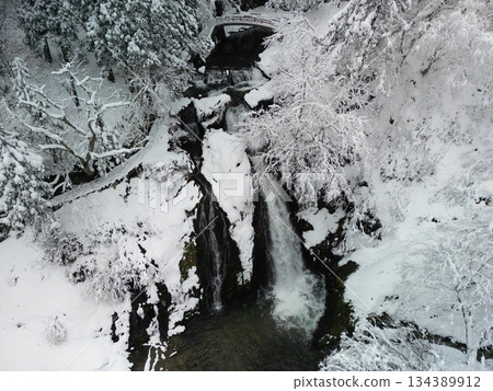 Snow scene at Shirogane Falls 134389912