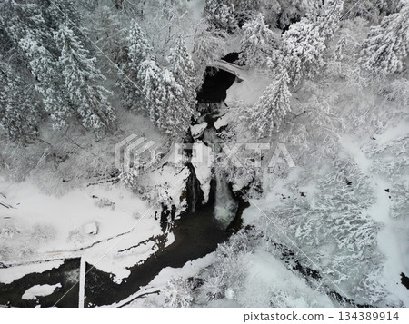 Snow scene at Shirogane Falls Snow scene at Shirogane Falls 134389914