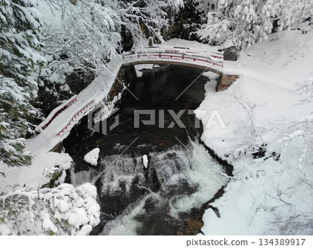 Snow scene at Shirogane Falls 134389917