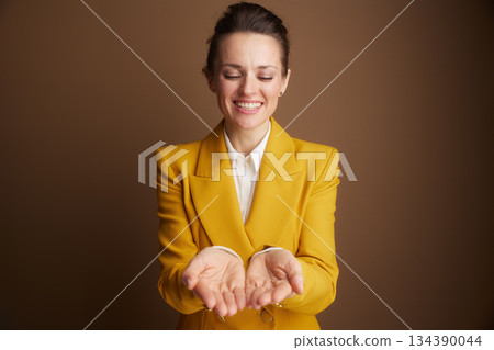 Grateful Professional Woman Offering a Solution Grateful Professional Woman Offering a Solution 134390044